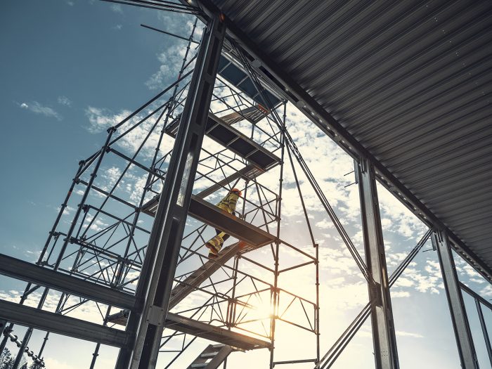 Byggarbetare på byggställning